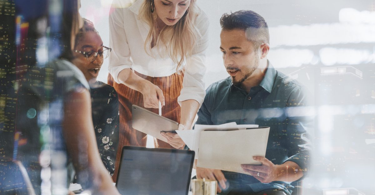 Business people working with a digital tablet in a meeting