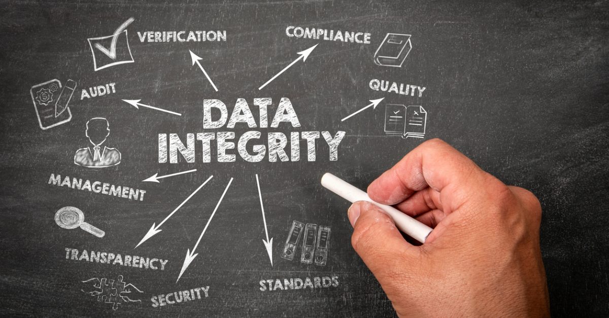 Data integrity. Illustration with icons, arrows and keywords on a black chalkboard background